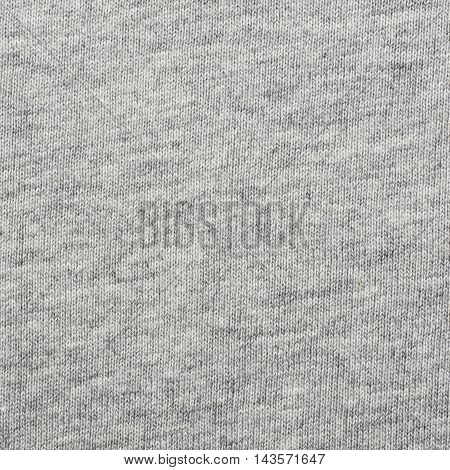 Fragment of a grey cloth fabric material texture as an abstract background composition