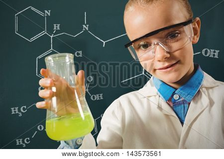 Girl dressed as a chemist against science formula
