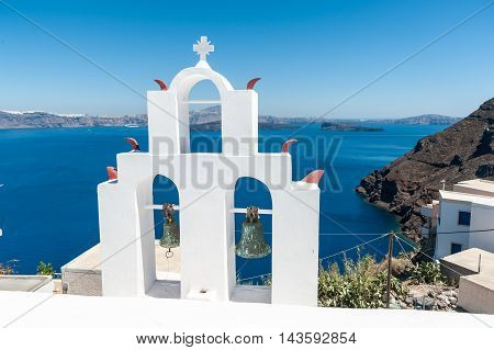 White bell tower in Thirasia - Santorini - Greece