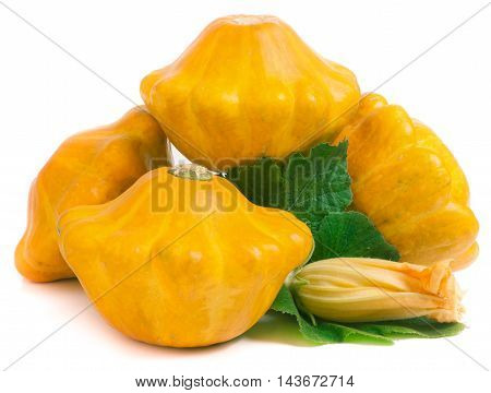 four yellow pattypan squash with leaf and flower isolated on white background.