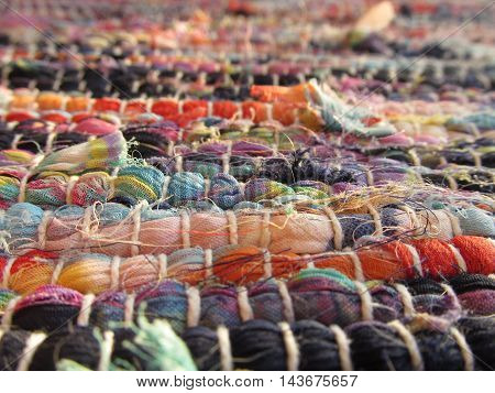 Woven bright multicolored textile cotton rug carpet