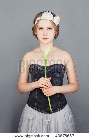 Fashion Model Girl. Fashionable Teenager Girl Wearing a Strapless Princess Prom Dress and Bohemian Boho Chic Hairstyle