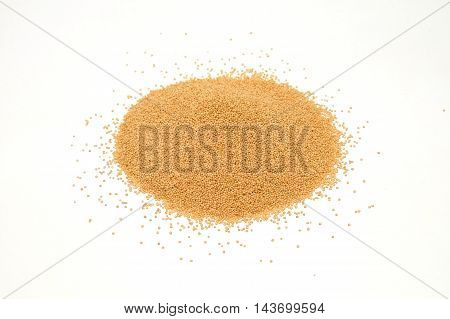 Amaranth grains pile isolated on white background