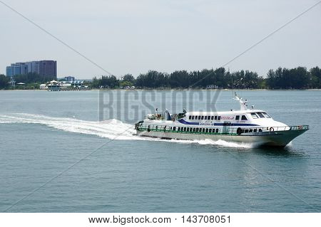 Labuan,Malaysia-Aug 19,2016:A Labuan Express ferry carries passengers from Labuan Island to Kota KInabalu.Its a passenger ferry service operator,tourist attraction & cheaper transportation to Labuan.