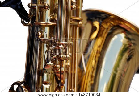 Fragment Of  Saxophone On White Background.