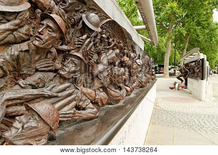 LONDON UK - JULY 8 2016: The Battle of Britain Memorial on the Victoria Embankment a 25m-long bronze monument commemorating the pilots who died during WWII's Battle of Britain.