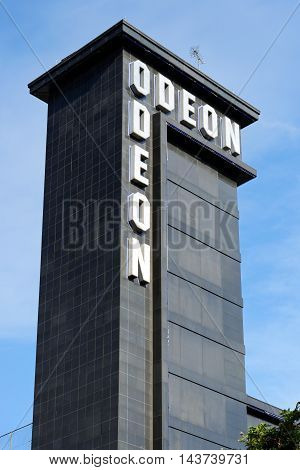 LONDON ENGLAND - JULY 8 2016: Outside view of Odeon British chain of cinemas one of the largest in Europe founded 1928 by Oscar Deutsch Leicester Square branch.