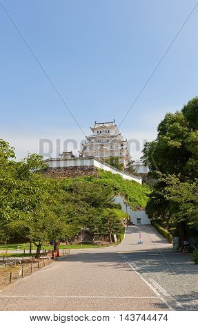HIMEJI JAPAN - JULY 21 2016: Main keep (tenshukaku) of Himeji castle (White Egret Castle circa 1609) after repairing works ended 2015. National Treasure of Japan and UNESCO World Heritage Site