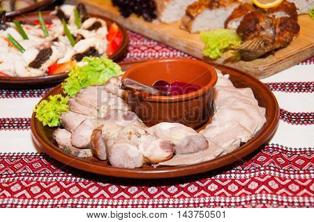 Meat cutting with tomato sauce and vegetable
