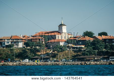 NESSEBAR BULGARIA AUGUST 31 2015: Panoramic view of ancient town of Nessebar from sea. Church Of The Holy Virgin Old Town Nessebar.