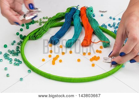 set for making a Dreamcatcher beads thread on a white background