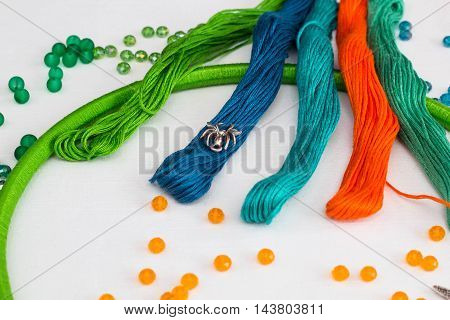 set for making a Dreamcatcher beads thread on a white background