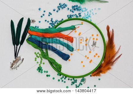set for making a Dreamcatcher beads thread on a white background