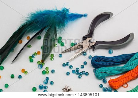 set for making a Dreamcatcher beads thread on a white background