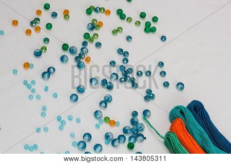 set for making a Dreamcatcher beads thread on a white background