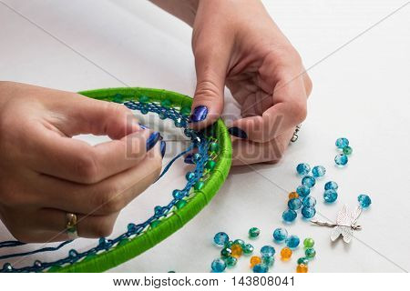set for making a Dreamcatcher beads thread on a white background