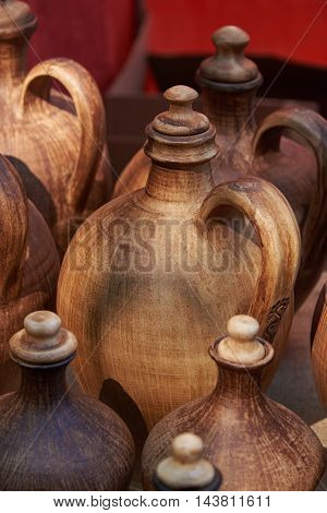 Ceramic bottle of clay handmade with natural sunlight. Bottles with ceramic caps