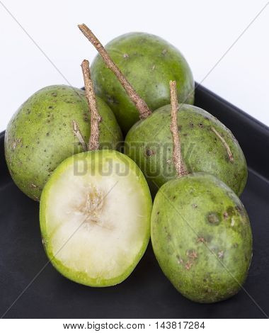 Fresh Hog Plum (wild Mango) On Black Dish