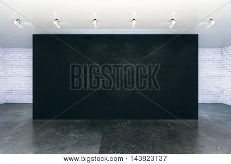 Empty black wall in interior with brick walls ceiling lamps and concrete floor. Mock up 3D Rendering