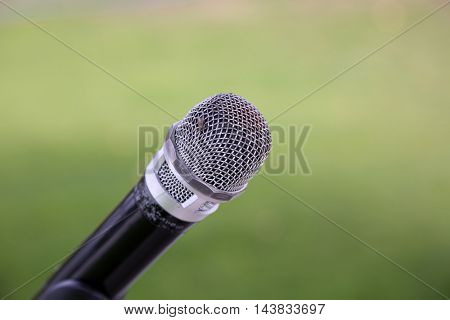 microphone with a house fly sitting on it