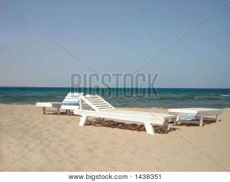 Chaise Longues na praia