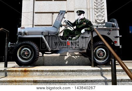 NYC - May 11 2013: A cut-out of General Dwight D. Eisenhower sitting in a jeep promotes the WWII & NYC exhibition at the New York Historical Society Museum