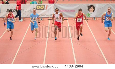 LINZ, AUSTRIA - FEBRUARY 6, 2015: Kiran Daly (#237 Great Britain) competes in the men's 60m event in an indoor track and field event.