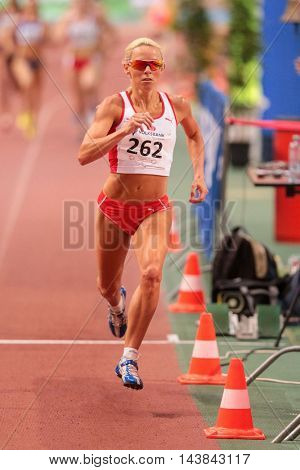VIENNA, AUSTRIA - JANUARY 31, 2015: Jenny Meadows (#262 Great Britain) competes in the women's 800m event during an indoor track and field event.