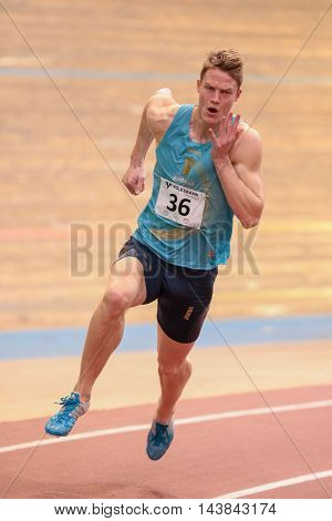 VIENNA, AUSTRIA - JANUARY 31, 2015: Luka Janezic (#36 Slovenia) competes in the men's 400m event during an indoor track and field event.