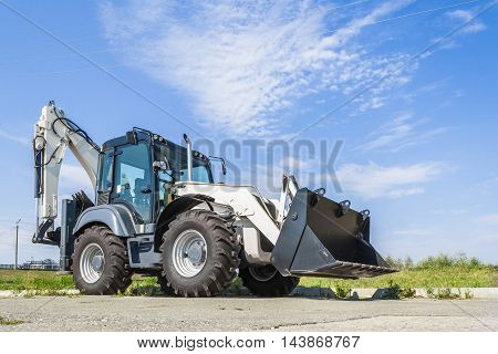 The New Tractor Is On The Road In The City