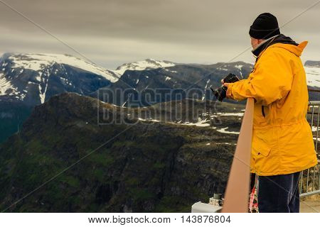 Tourist Taking Photo From Dalsnibba Viewpoint Norway