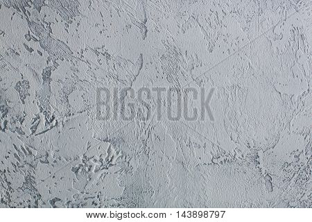 Gray plaster abstract textured uneven wall background