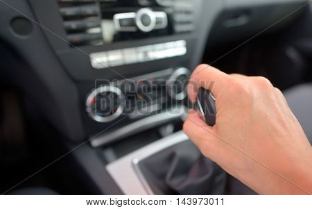 man driver hand shifting the gear stick