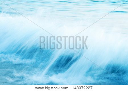 Abstract image of splasing sea waves intentional long exposure
