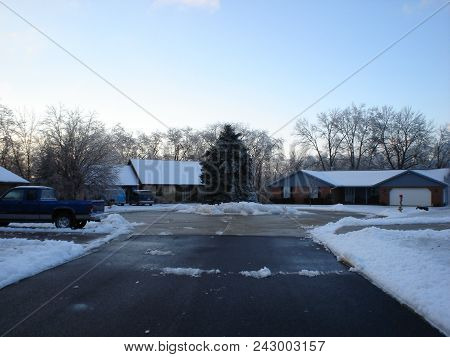 Cul De Sac With A Pine Tree In The Middle In Winter With Snow Under A Clear Blue Sky, Pandora, Oh Ja