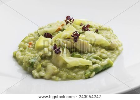 Plate Of Risotto Carnaroli With Asparagus, Scallops And Ginger