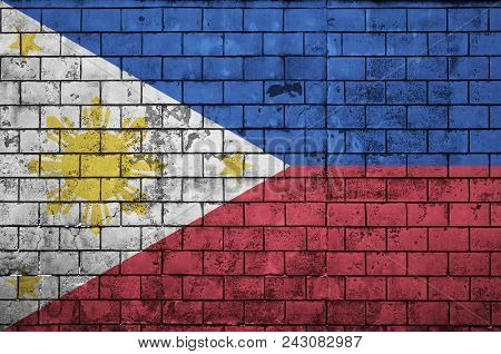 Philippines Flag Is Painted Onto An Old Brick Wall