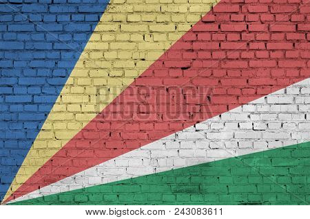 Seychelles Flag Is Painted Onto An Old Brick Wall