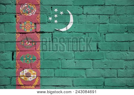 Turkmenistan Flag Is Painted Onto An Old Brick Wall