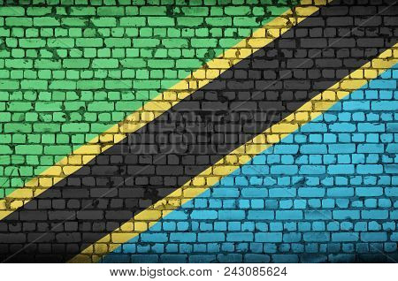 Tanzania Flag Is Painted Onto An Old Brick Wall