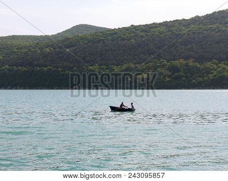 Abrau-durso - May 5, 2018: People Rest At The Mountain Lake Abrau. Abrau-durso, Krasnodar Region, Ru