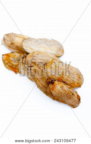 Dried Mango Seeds Or Sukhi Aam Ki Ghuthli Isolated On White.