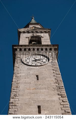 High Tower Of Saint Lawrence Church In A Little Town Close To Madonna Di Campiglio