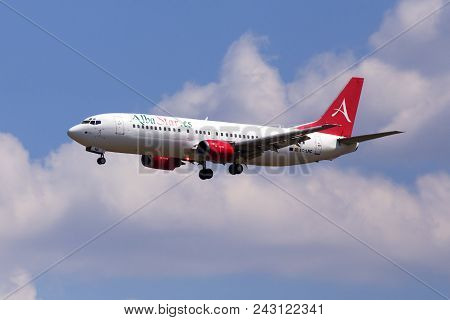 Borispol, Ukraine - May 25, 2018: Ec-lnc Alba Star Boeing 737-400 Aircraft On The Cloudy Sky Backgro