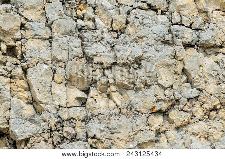 Textured Stone Background Rubble Ballast In Natural Form In The Rock Wall.