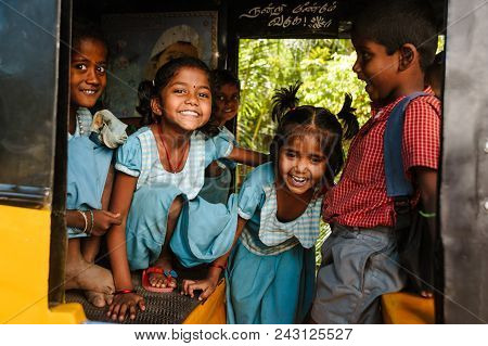 Group Of Indian Schoolgirls Smiling To Camera In Tuk Tuk Rickshaw, 23 February 2018 Madurai, India