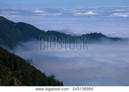 Mountain Ridge Overlooking A Sea Of Clouds Taken In The San Gabriel Mountains, Ca