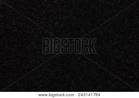 Black Fleecy Material Texture. Dark Detailed Fibers Fluffy Surface Background.