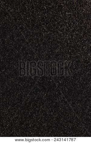 Black Fleecy Material Texture. Dark Detailed Fibers Fluffy Surface Background.