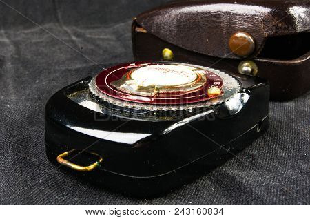 Donetsk, Ukraine - May 07, 2016: Old Vintage Soviet Exposure Meter Leningrad With Leather Case On Bl